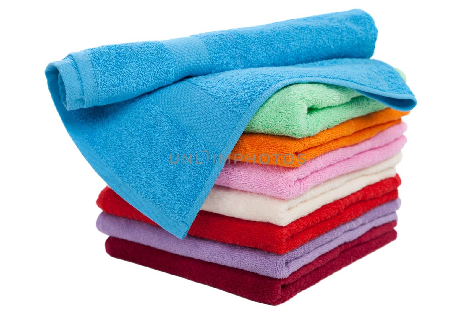 Clean cotton textile towel folded stack isolated