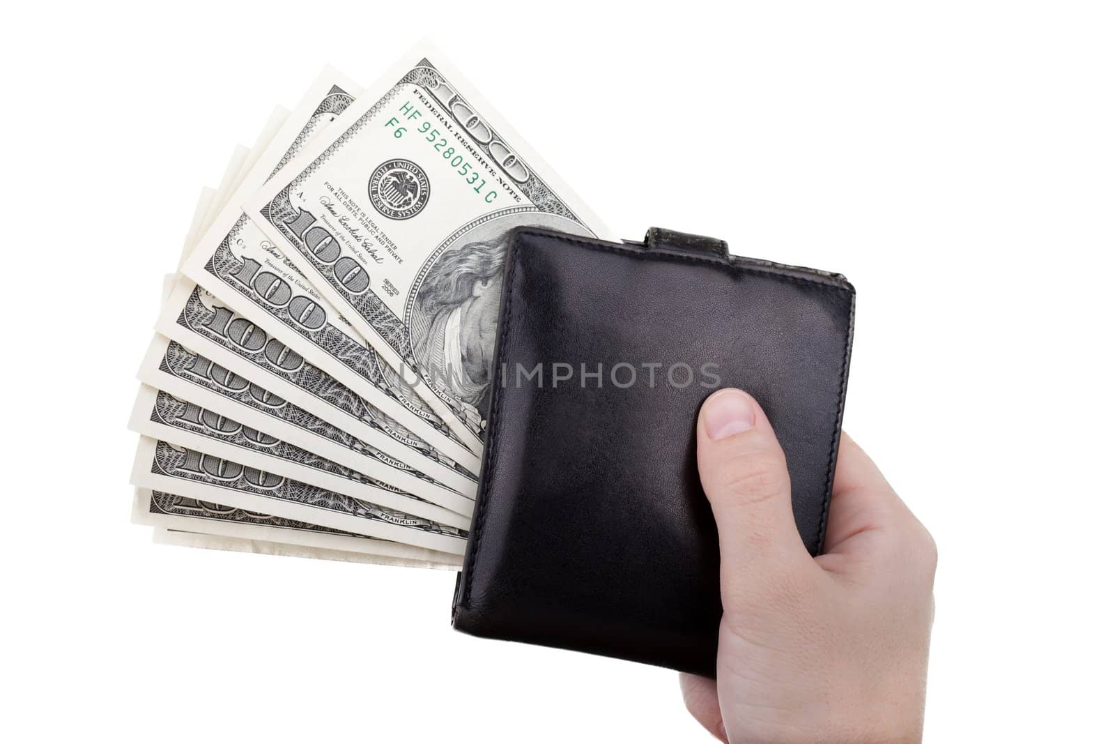 Human hand holding paper dollar currency in wallet