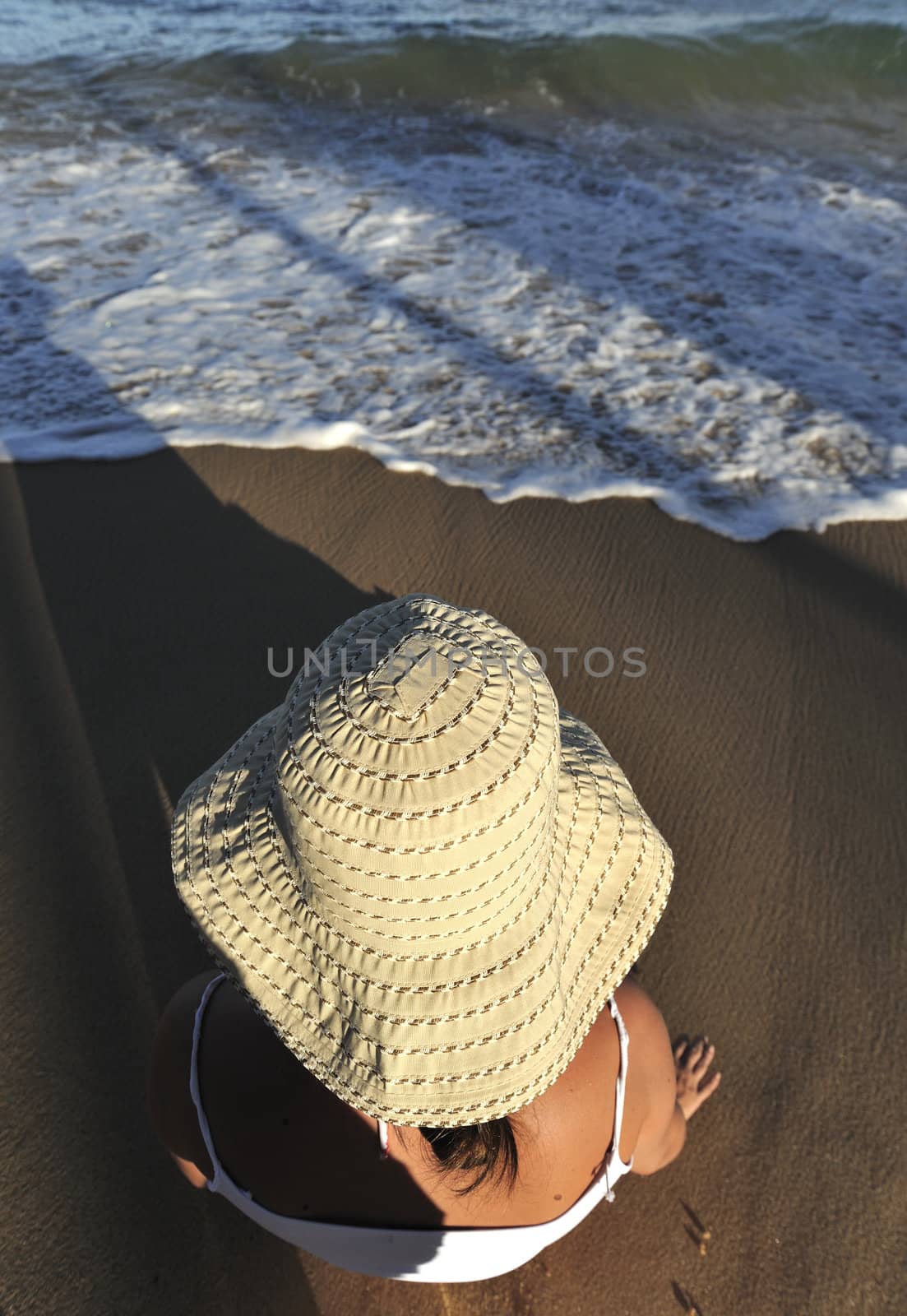 Woman relaxing on the beach