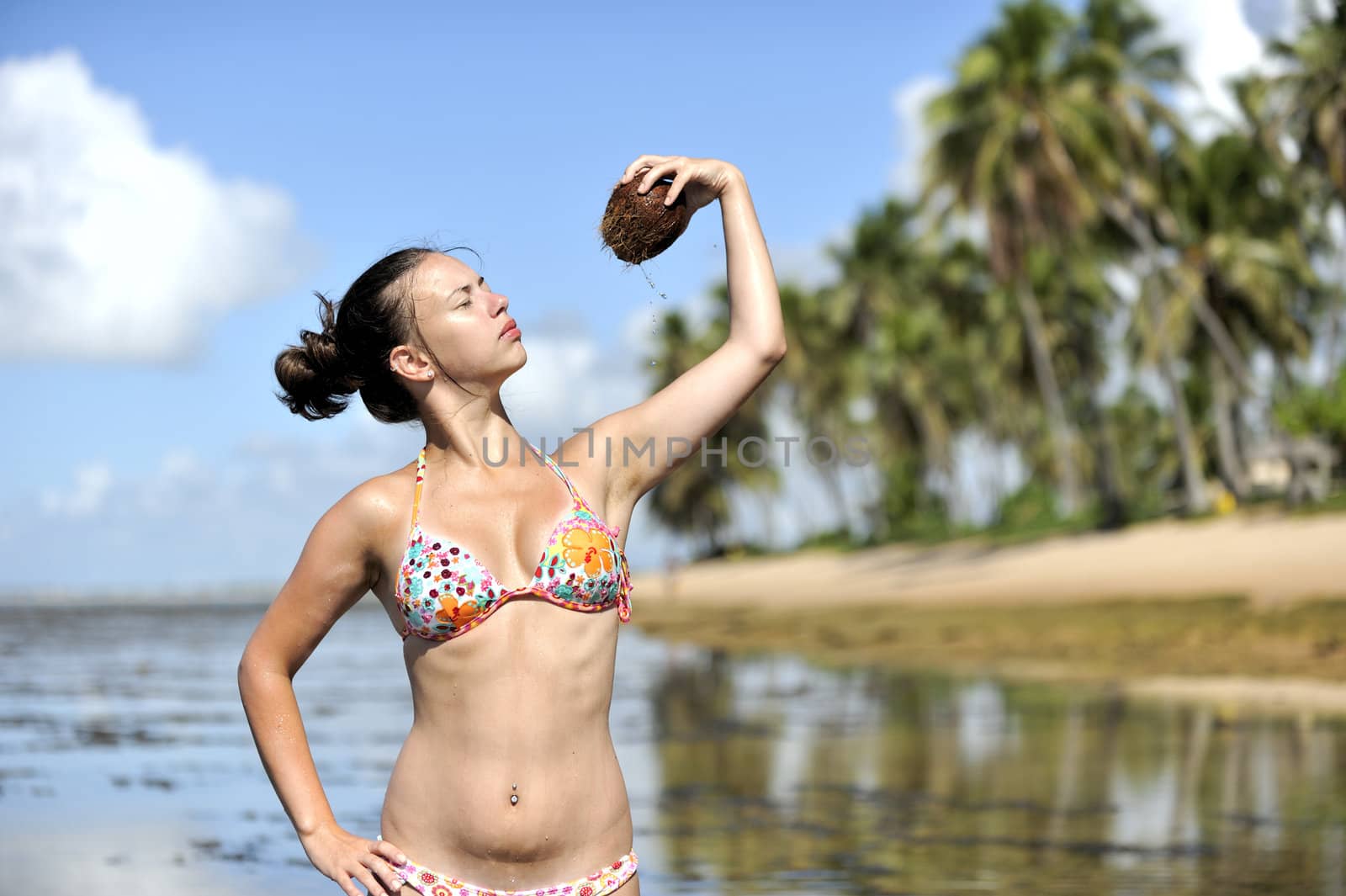 Woman refreshing on the beach