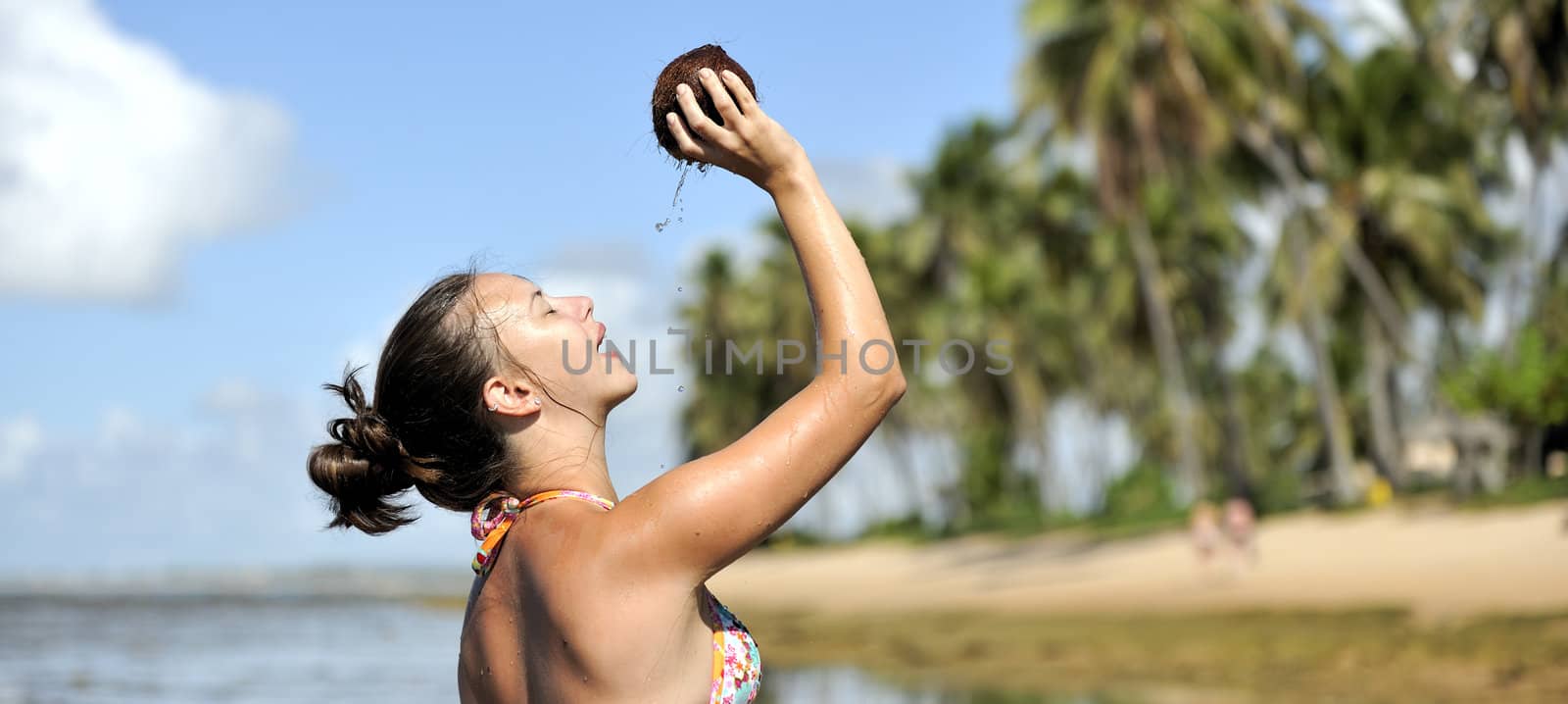 Woman refreshing on the beach