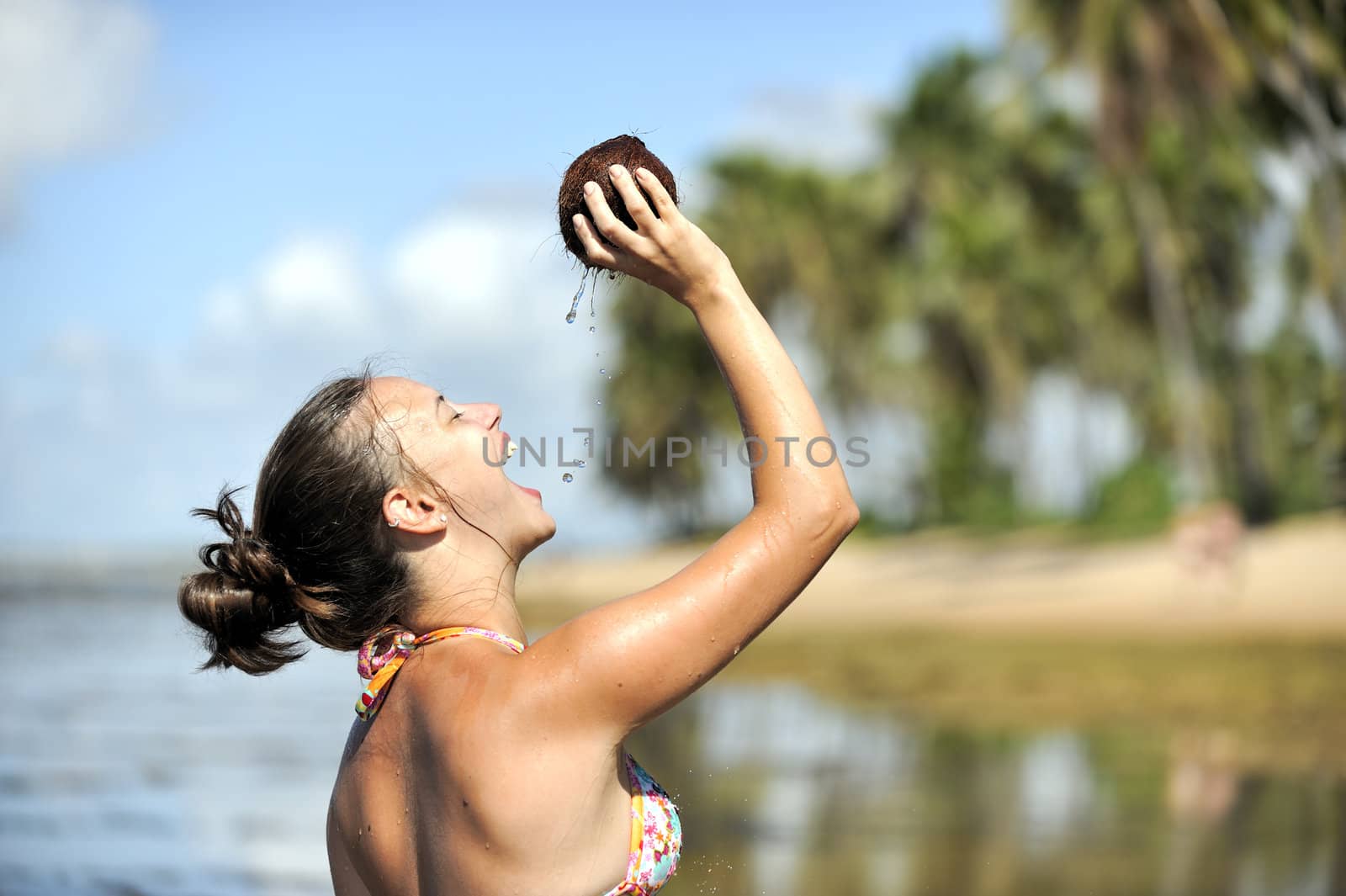 Woman refreshing on the beach