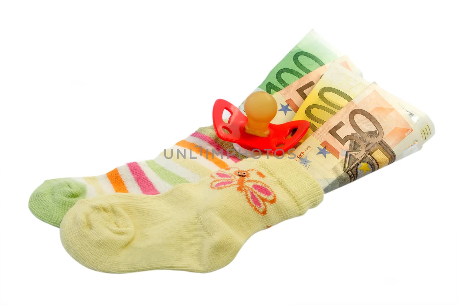 Baby socks with pacifier and euro banknotes iIsolated on white background.