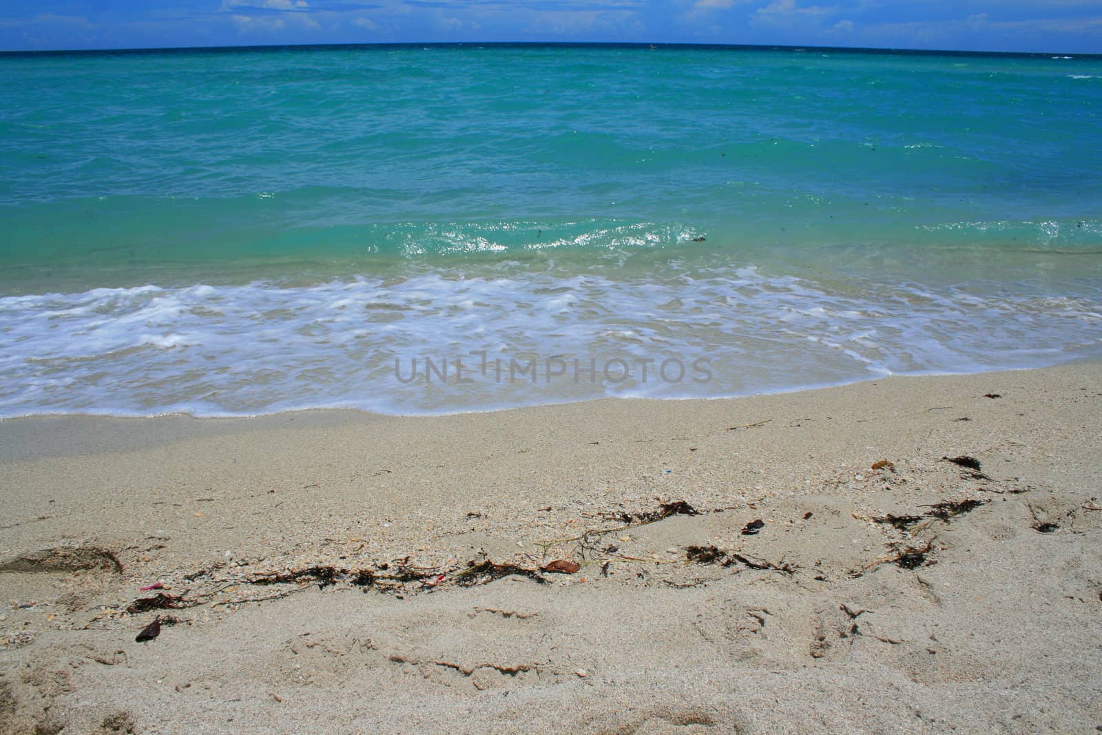 A seascape with beautiful and clear water.
