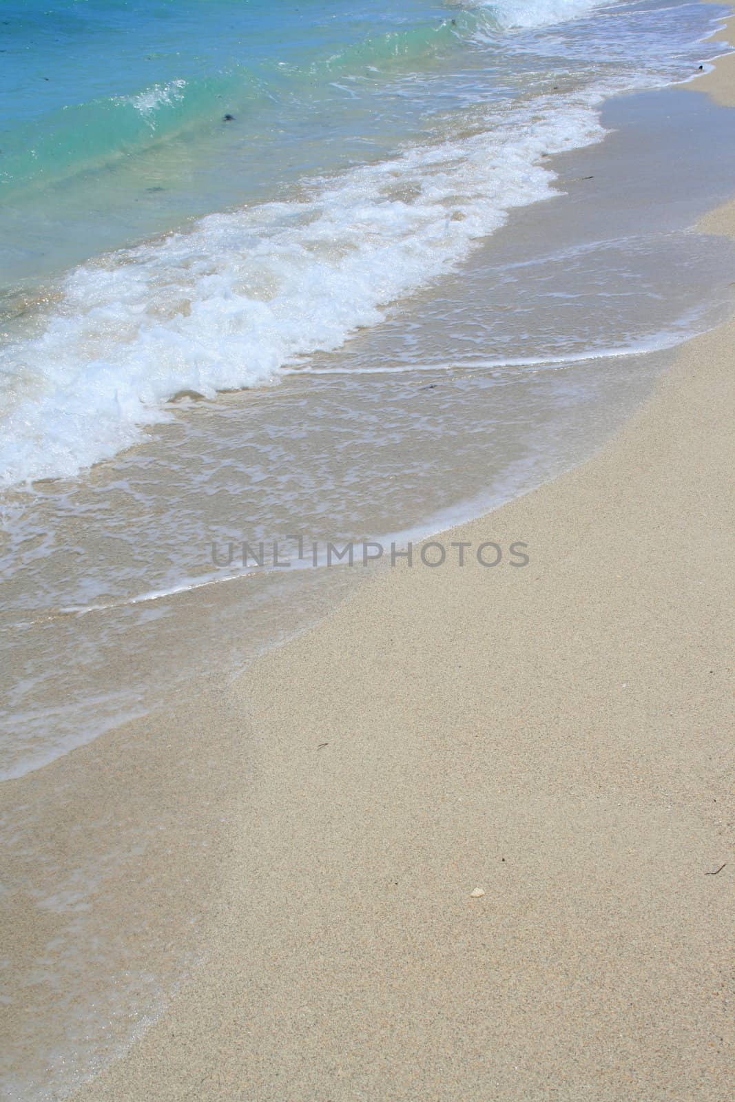 A seascape with beautiful and clear water.
