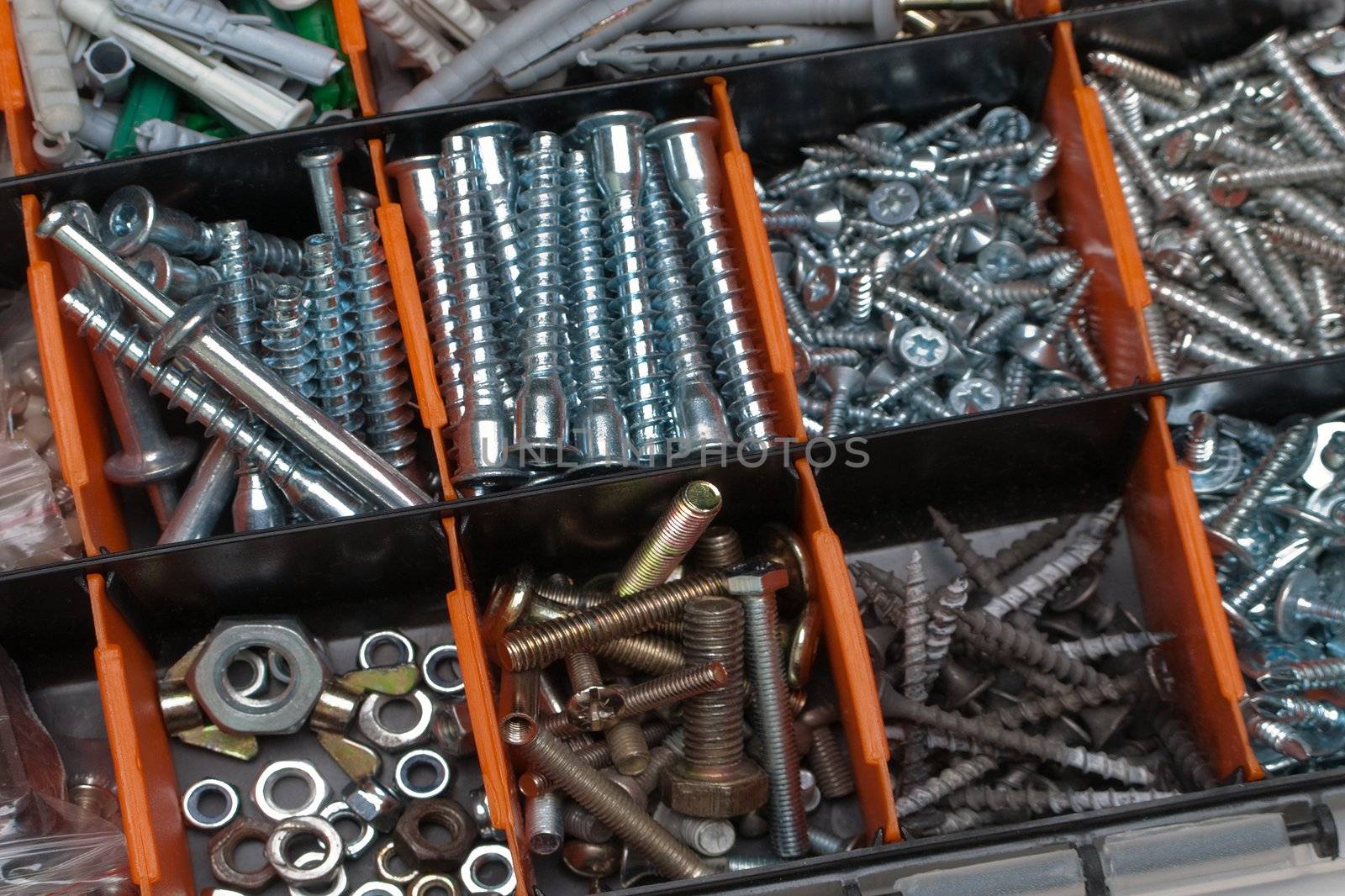 Toolbox - box with metal bolt, nut, screw, nail