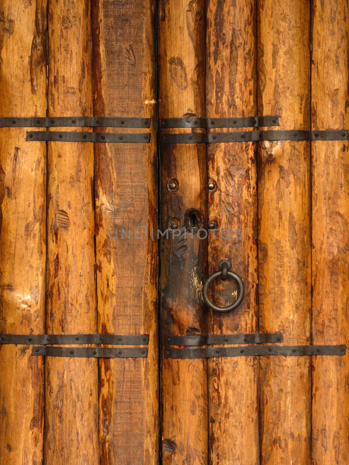 Old church closed entrance with wood door and lock