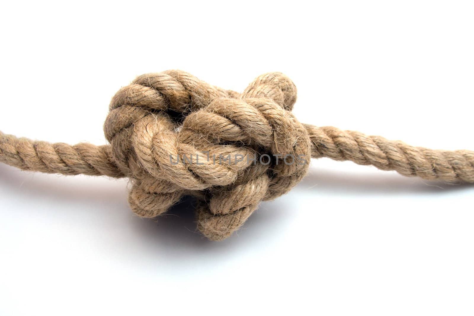 Tied up rope knot isolated on white background