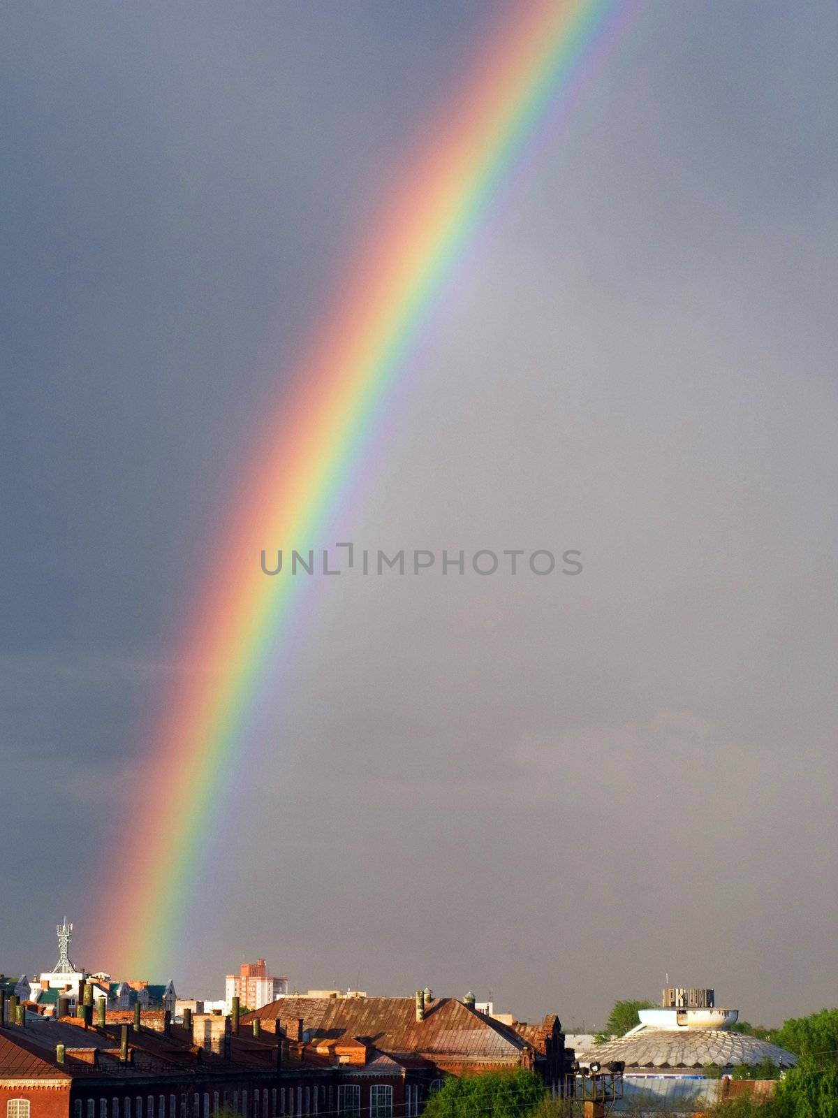 Rainbow multi color image on blue sky rain nature