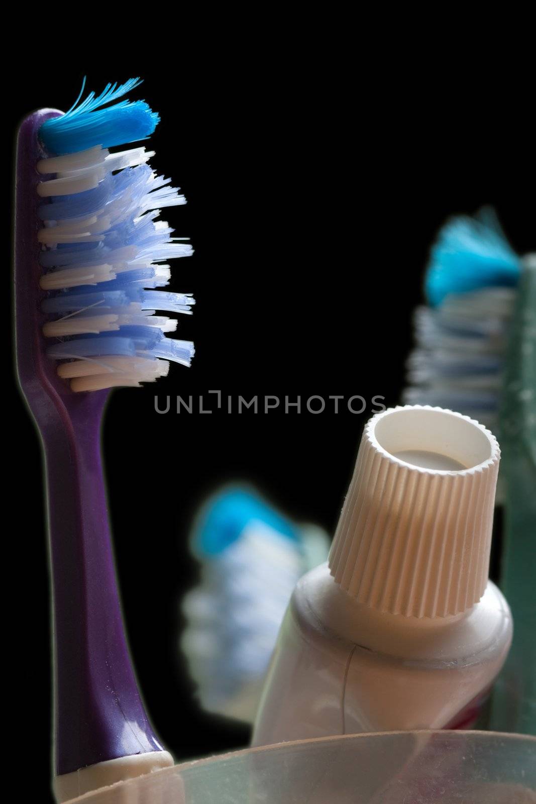 Toothbrush and toothpaste by ia_64