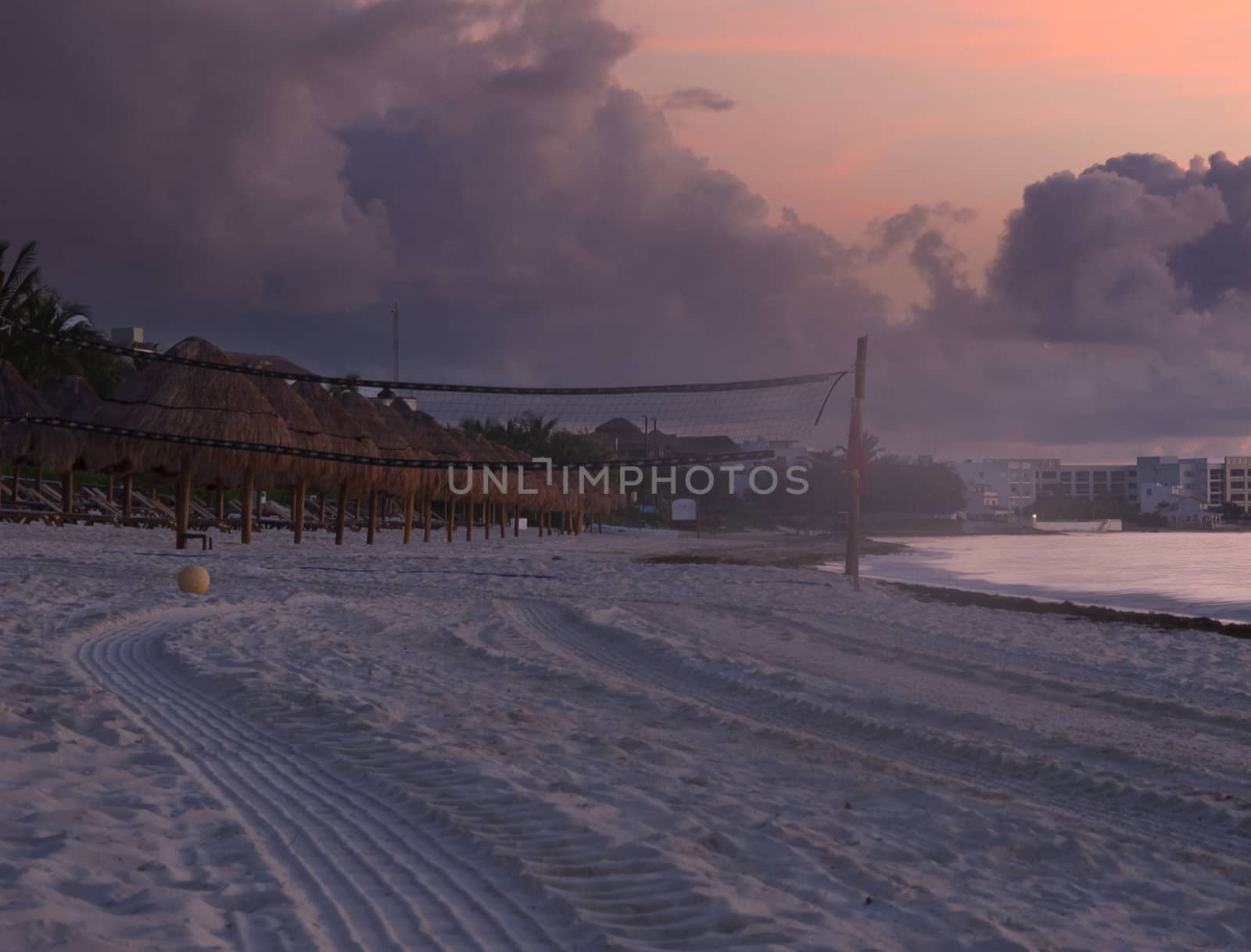 View of a beach volleyball field at sunrise