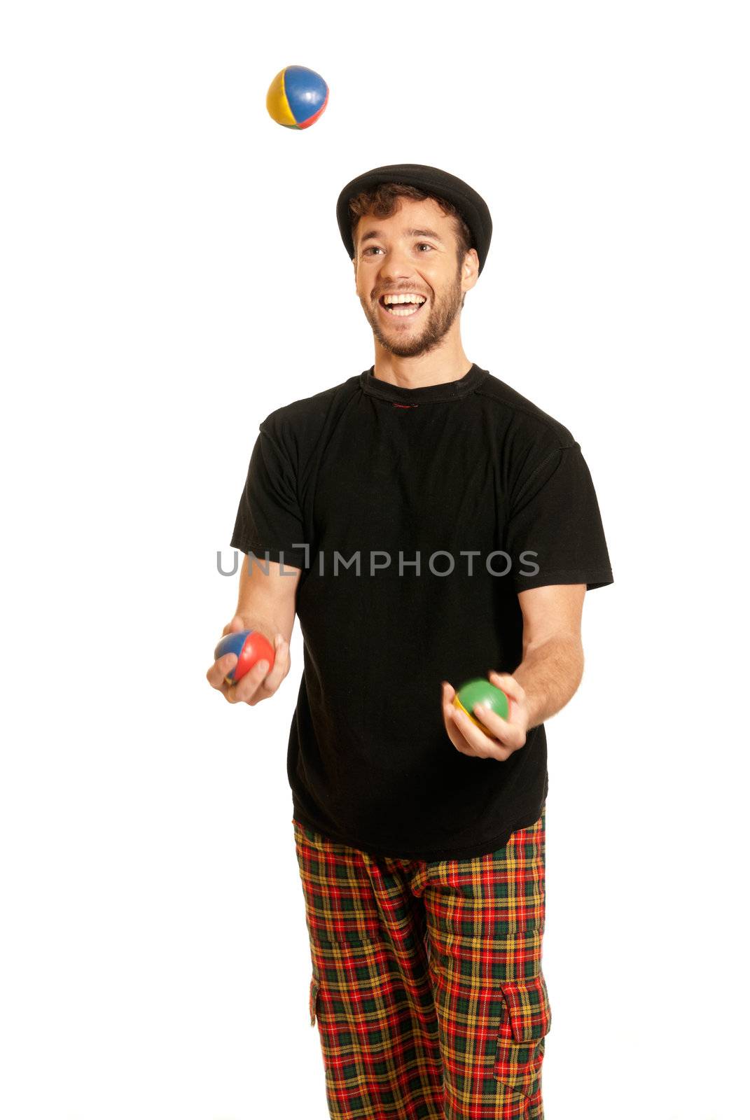 Young man juggling isolated on white background