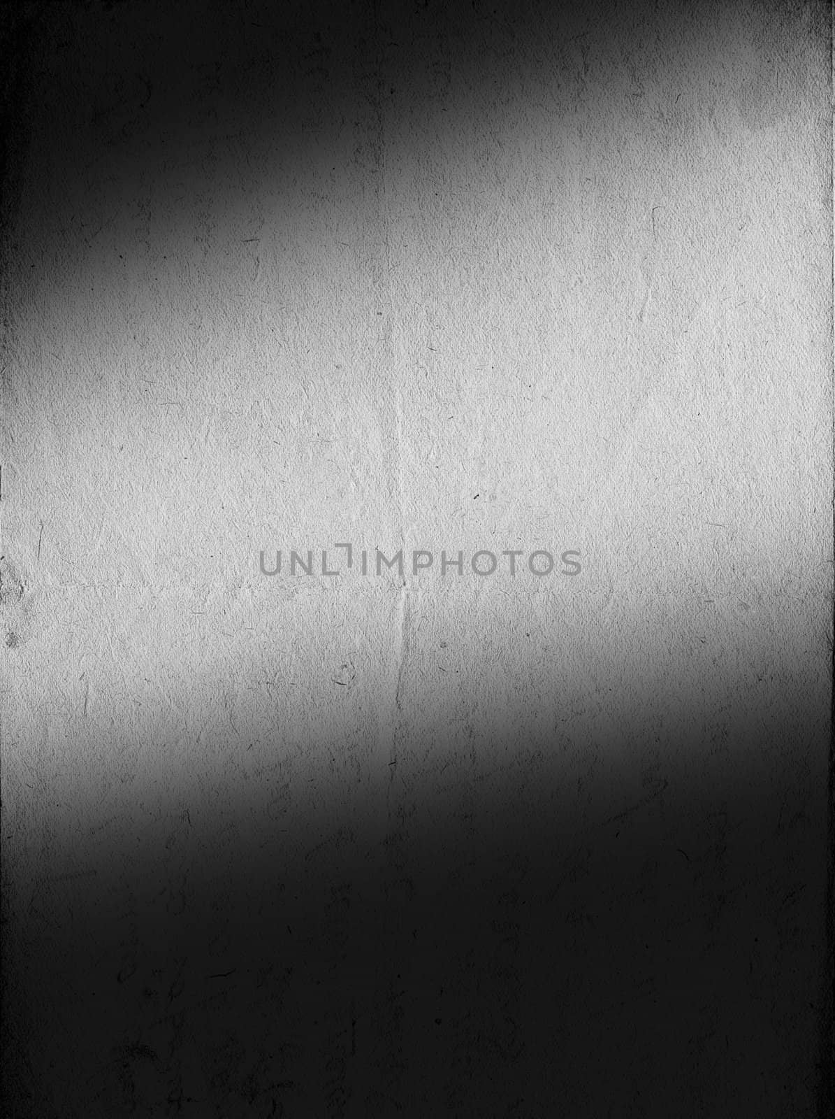 Vintage b&w paper with soft-lighted area for your text. Vertical orient.