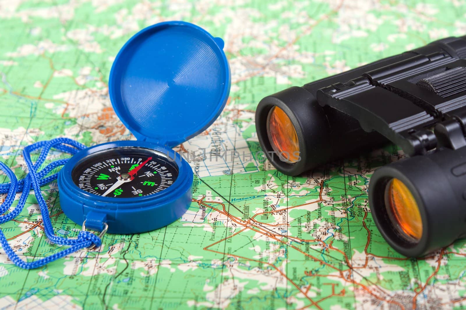 Travel north map direction compass and binoculars
