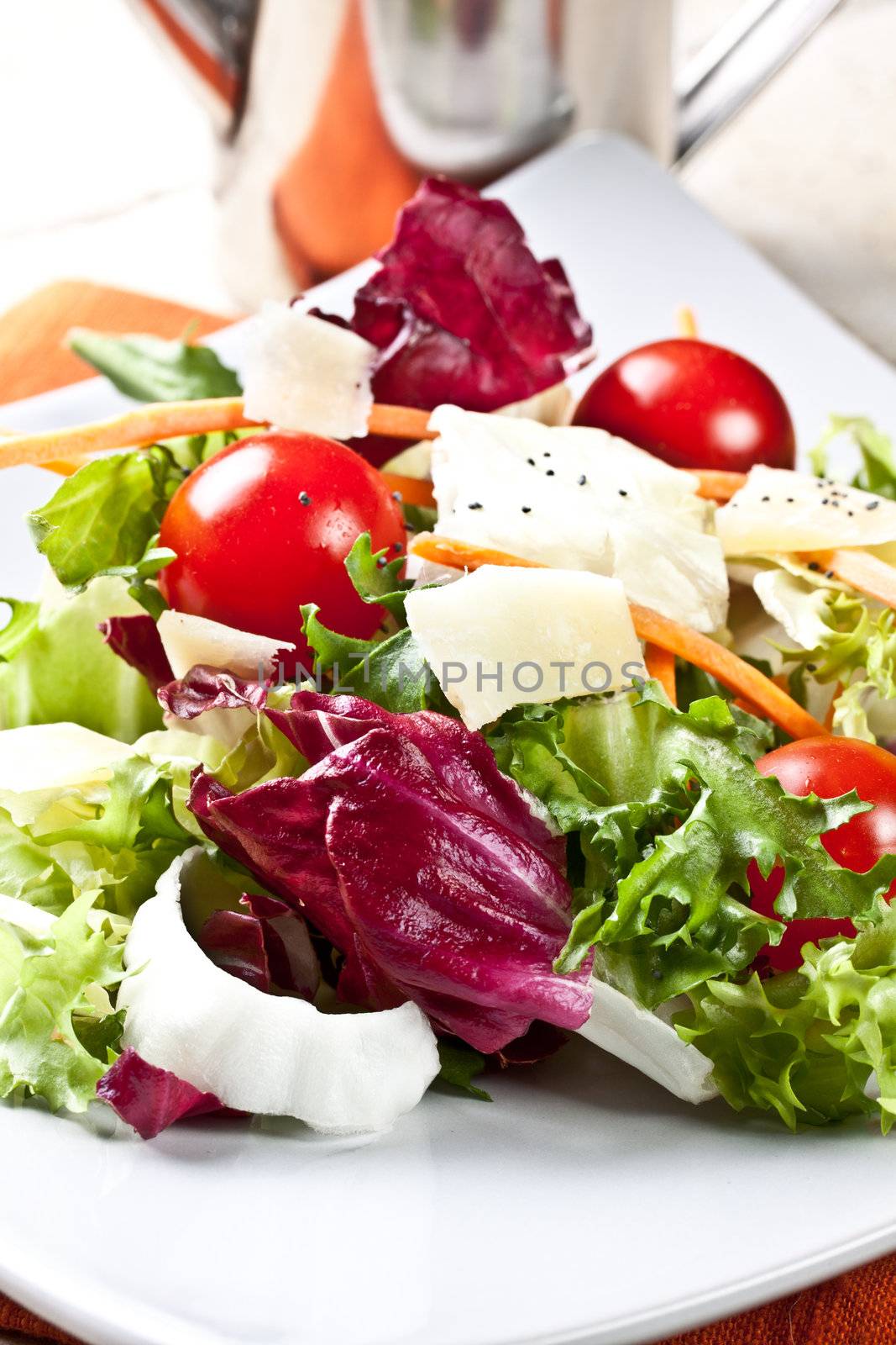 fresh mixed salad served on a plate