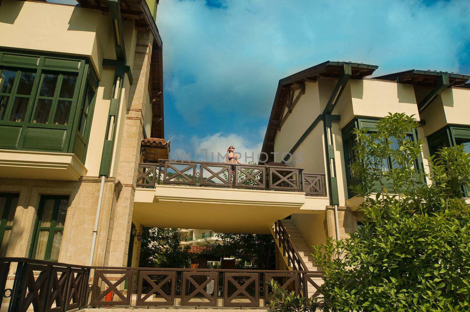 Red woman wearing bikini enjoying view by nikitabuida