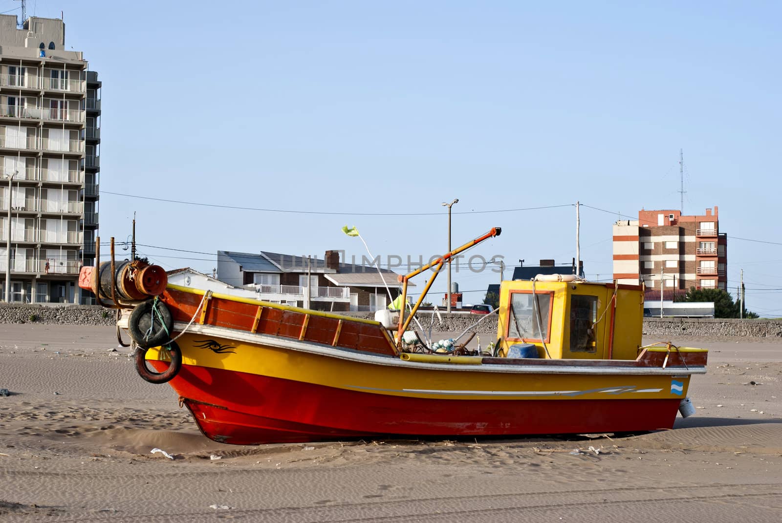 fishing boat on the beach by lauria