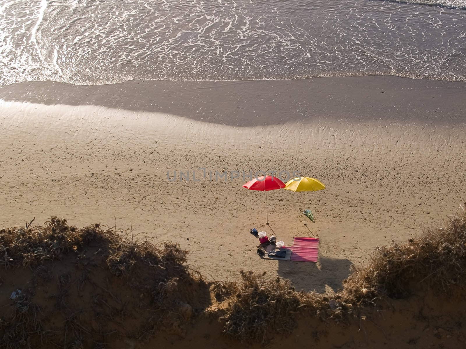 Colorful beach umbrella on a summer sunny day