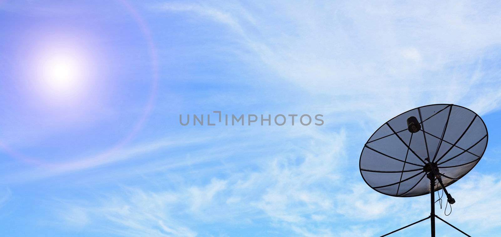 conceptual of antenna communication satellite dish over sunny blue sky