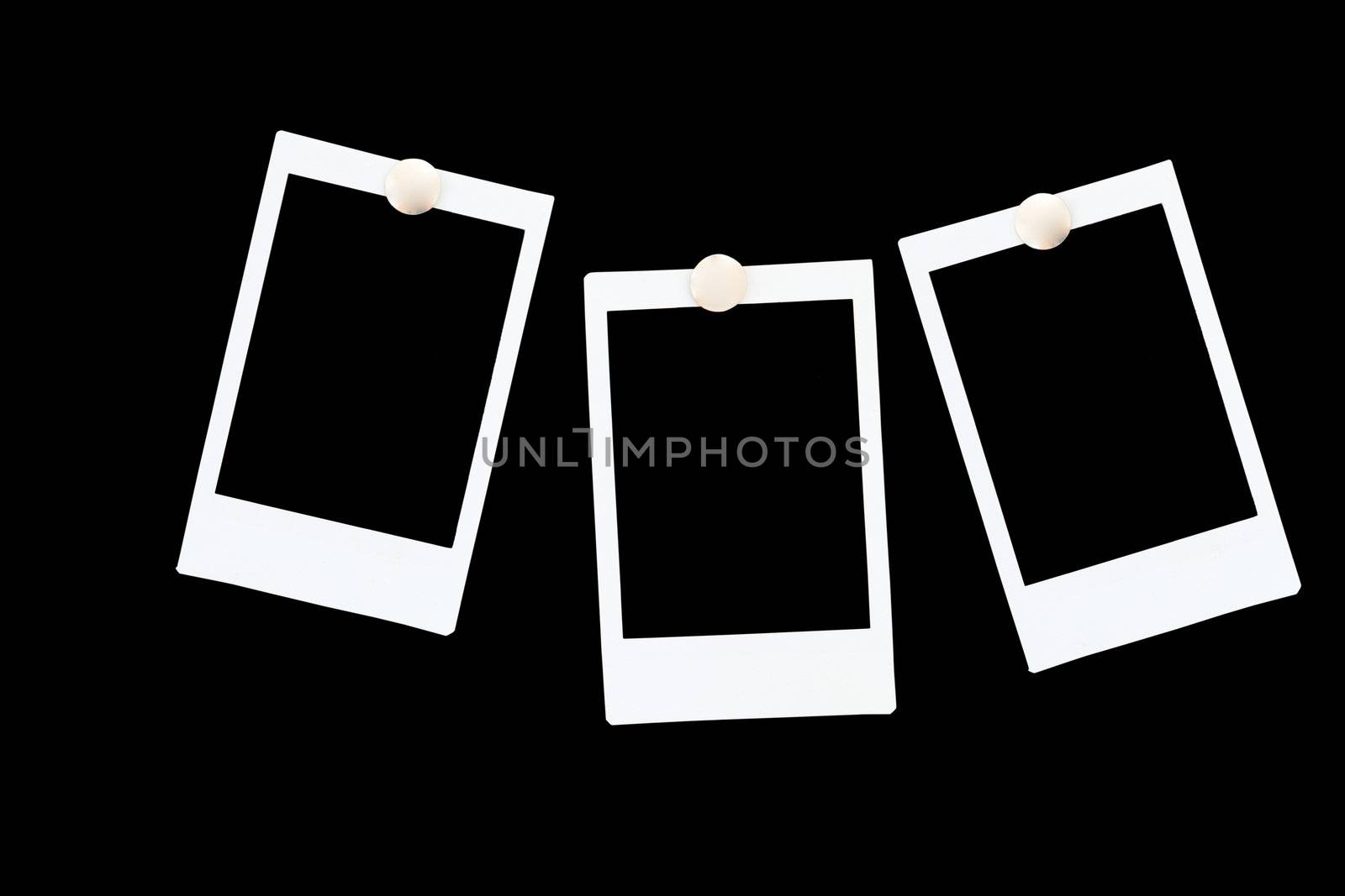 isolated blank polaroids frames on black background