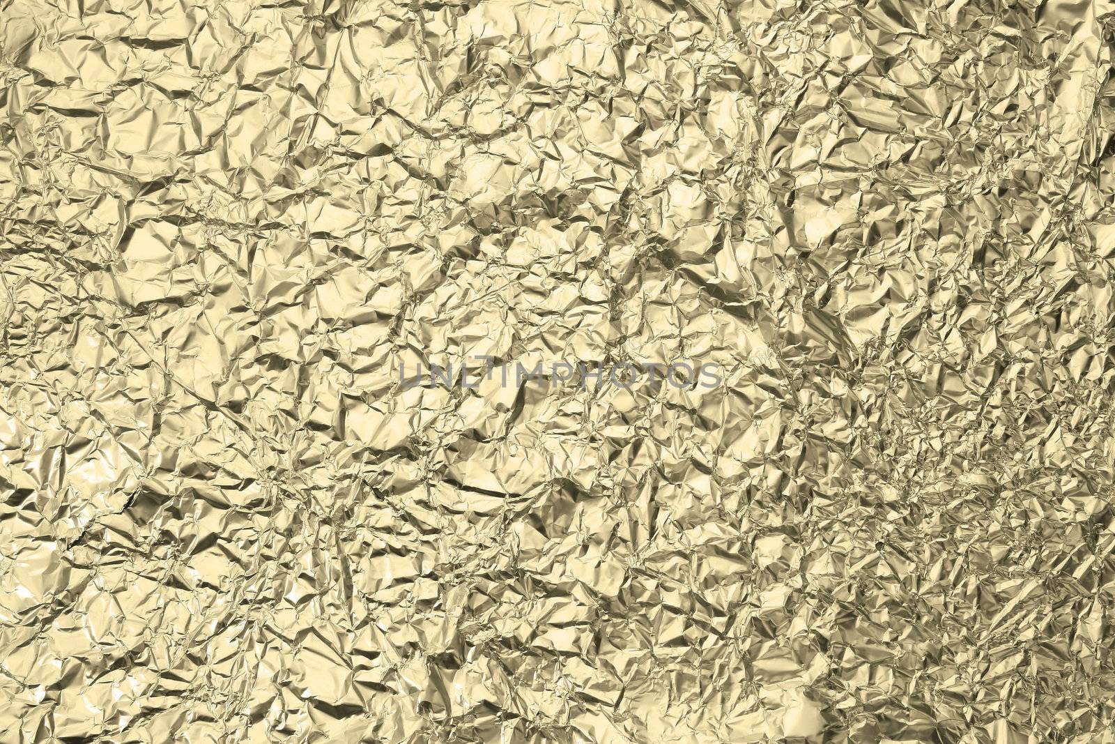 Pattern of Wrinkled Gold Aluminium Foil Paper using as background