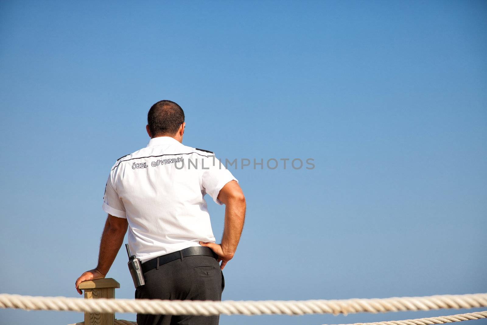 Security officer in Turkey on a blue sky