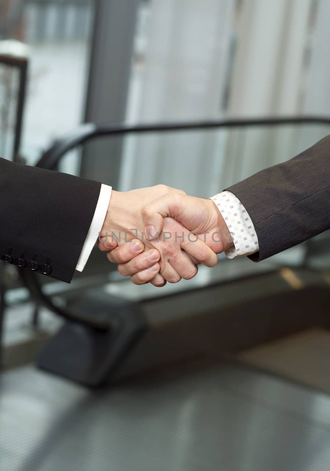 Close-up of a handshake with selective focus