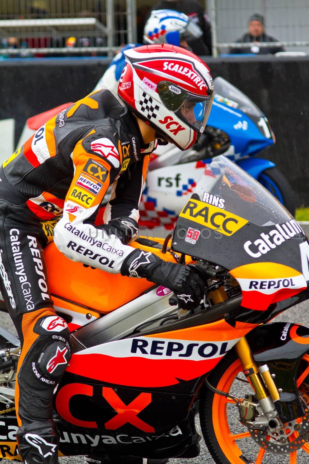 JEREZ DE LA FRONTERA, SPAIN - NOV 20: 125cc motorcyclist Alex Rins waiting on the starting gates in the CEV Championship race on November 20, 2011 in Jerez de la Frontera, Spain.