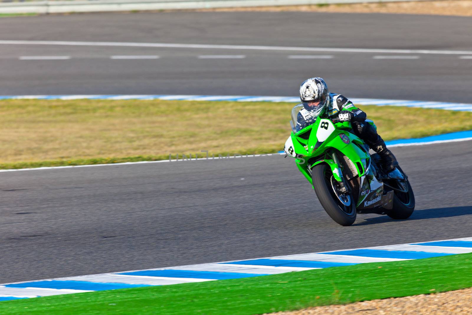 JEREZ DE LA FRONTERA, SPAIN - APR 16: Kawasaki Ninja Cup motorcyclist Adria Araujo takes a curve in the CEV Championship race on April 16, 2011 in Jerez de la Frontera, Spain.