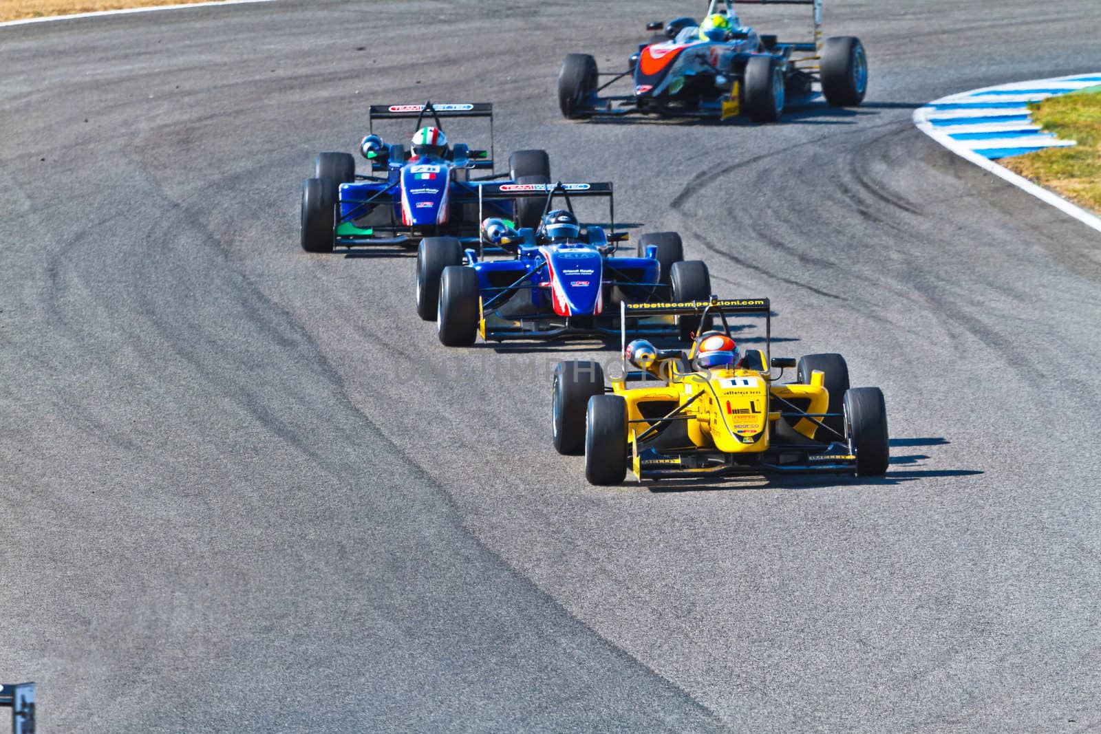 JEREZ DE LA FRONTERA, SPAIN - OCT 16: Matteo Torta(11) followed by Tatiana Calderon (4) and Luca Orlandi(28) races on European F3 championship on October 16 , 2011, in Jerez de la Frontera , Spain