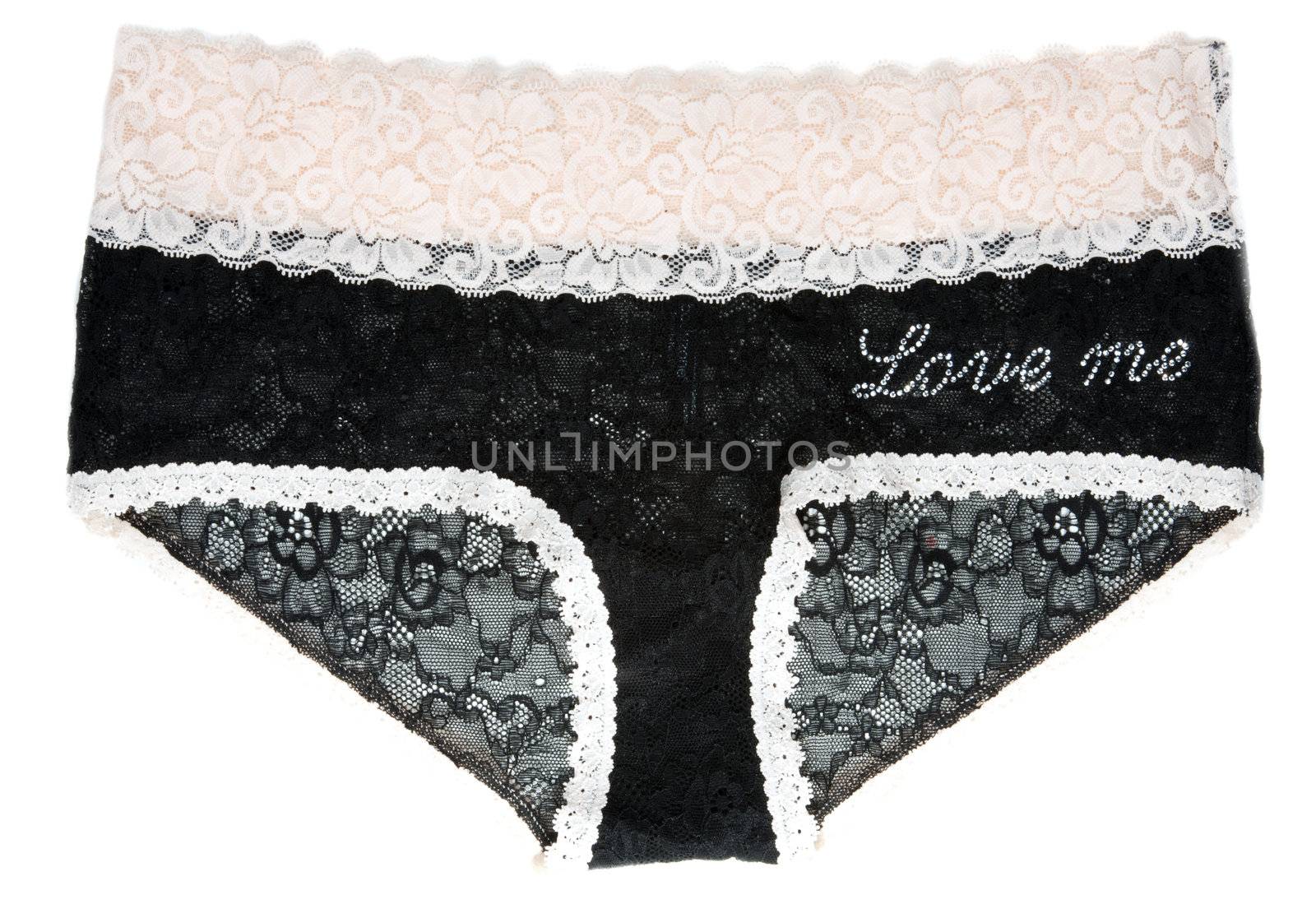 Black lacy feminine panties with inscription love me on white background