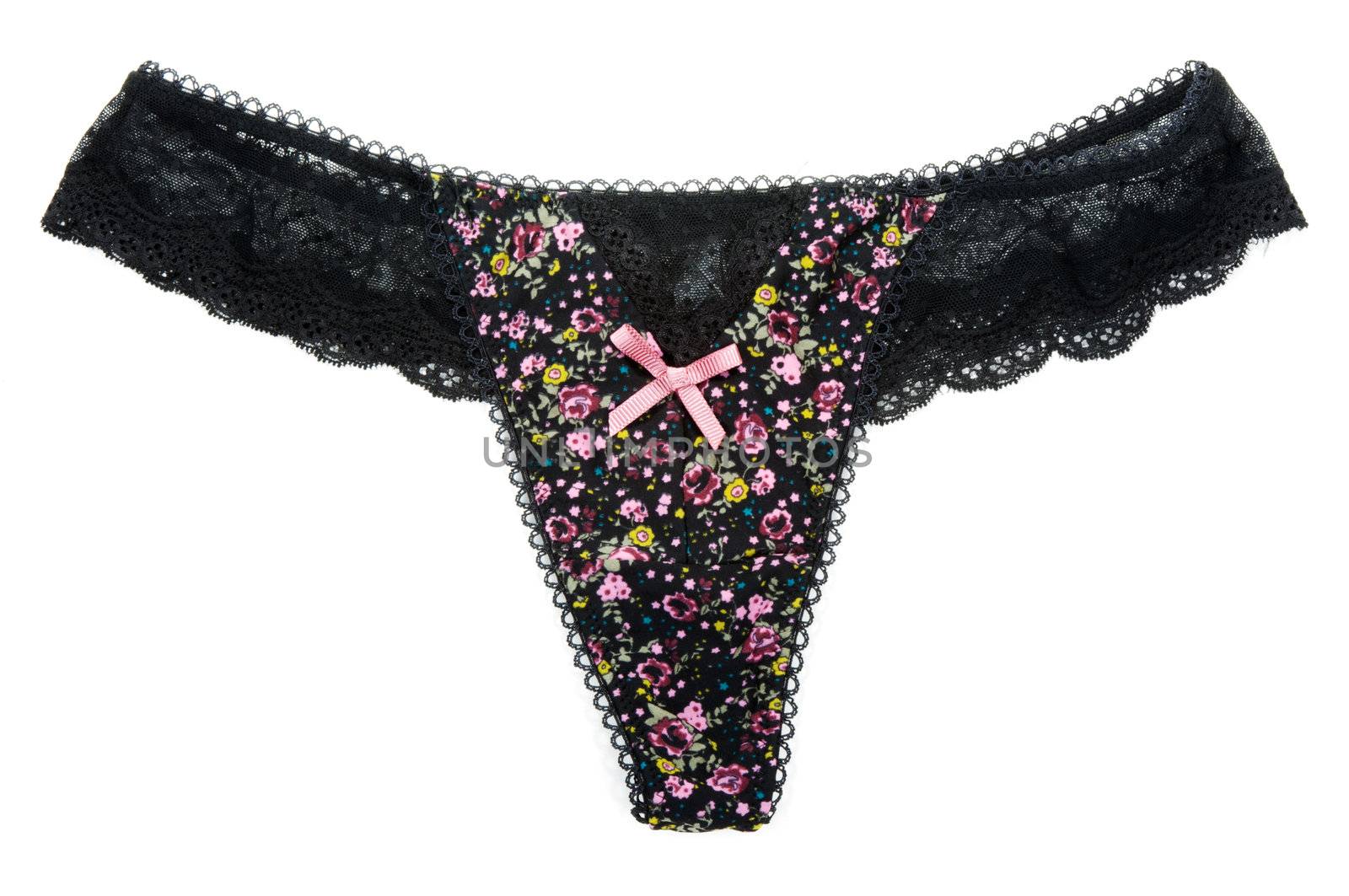 Black feminine panties with drawing in the manner of flower on white background