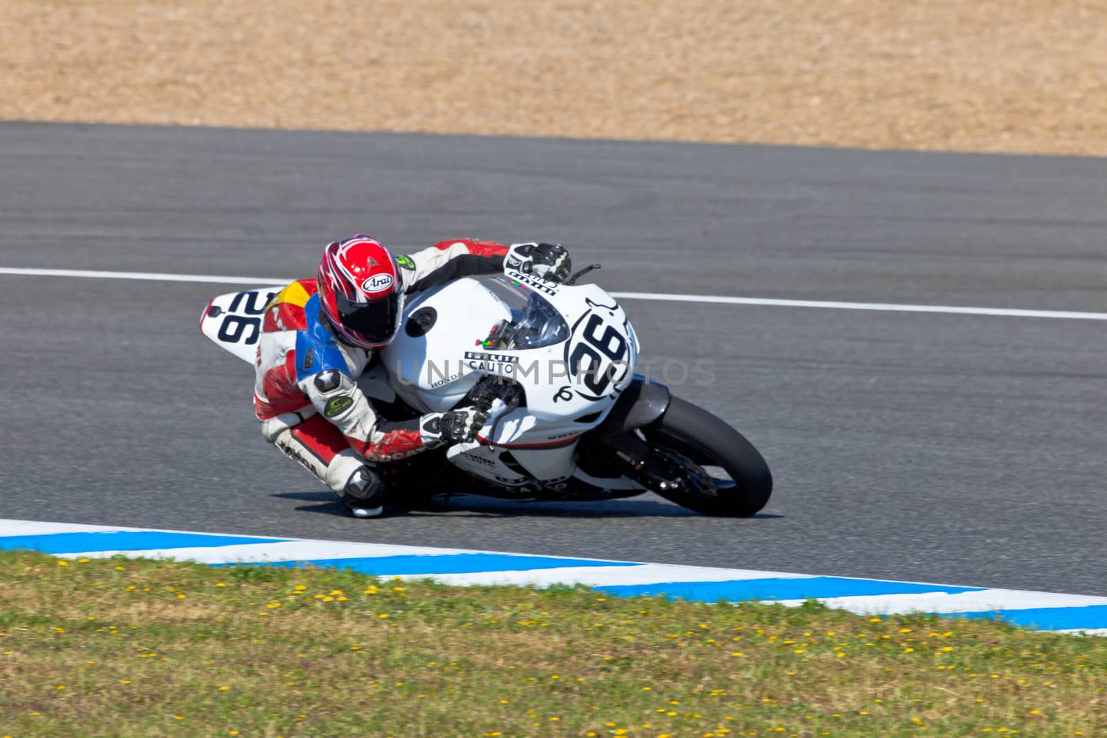 JEREZ DE LA FRONTERA, SPAIN - APR 16: Stock Extreme motorcyclist Adrian Gandara Gutierrez takes a curve in the CEV Championship race on April 16, 2011 in Jerez de la Frontera, Spain