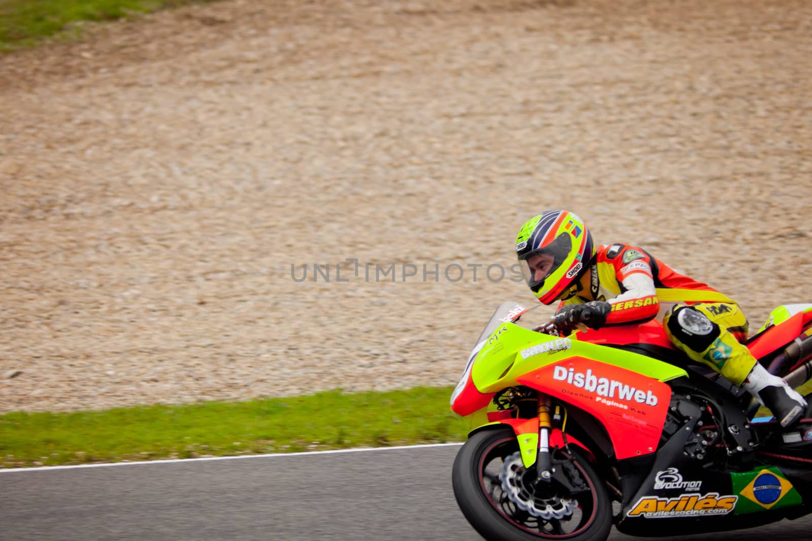 JEREZ DE LA FRONTERA, SPAIN - NOV 20: Stock Extreme motorcyclist Jose Gomez takes a curve in the CEV championship on Nov 20, 2010, in Jerez de la Frontera, Spain