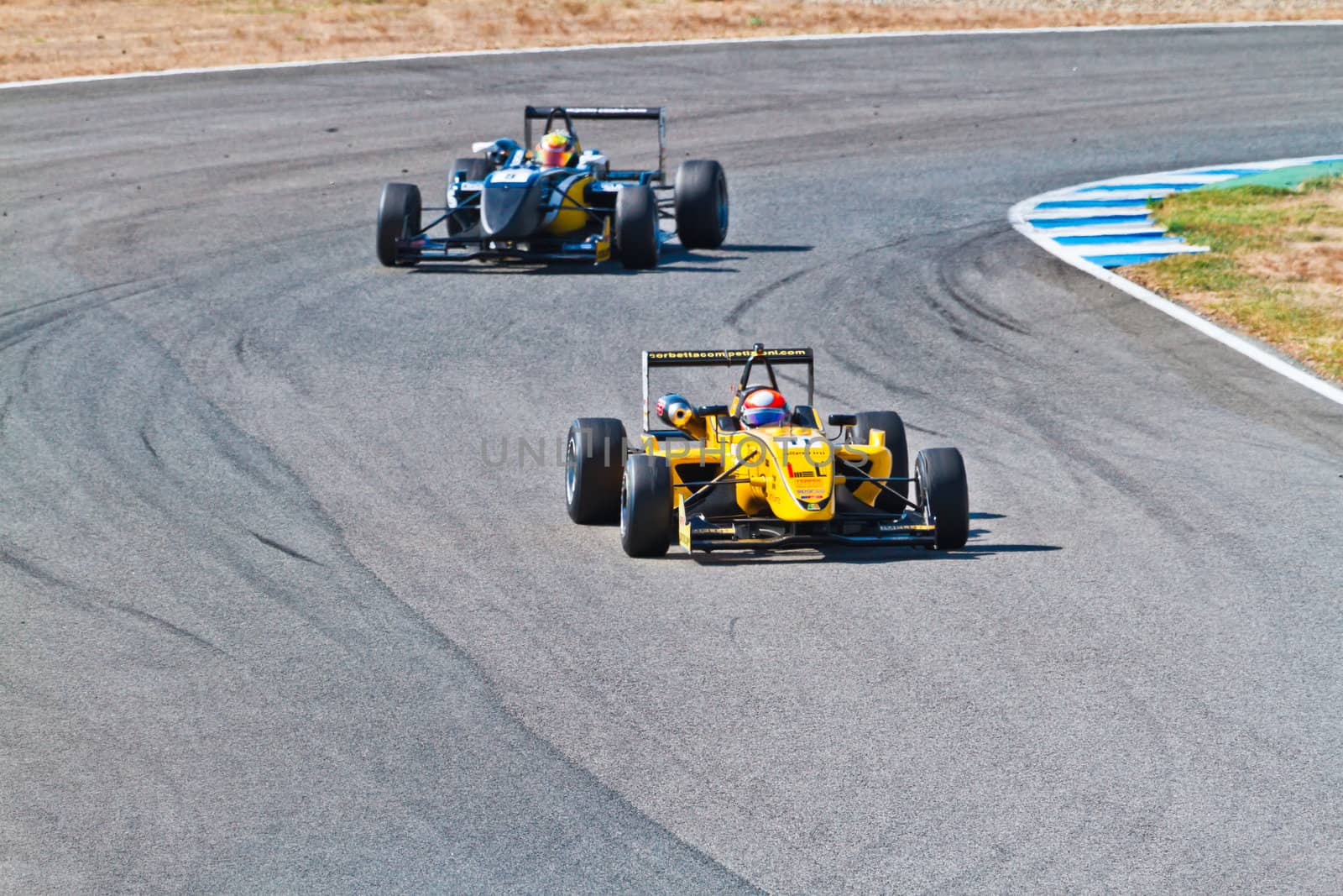 JEREZ DE LA FRONTERA, SPAIN - OCT 16: Matteo Tortan(11) followed by Yann Cunha (9) races on European F3 championship on October 16 , 2011, in Jerez de la Frontera , Spain