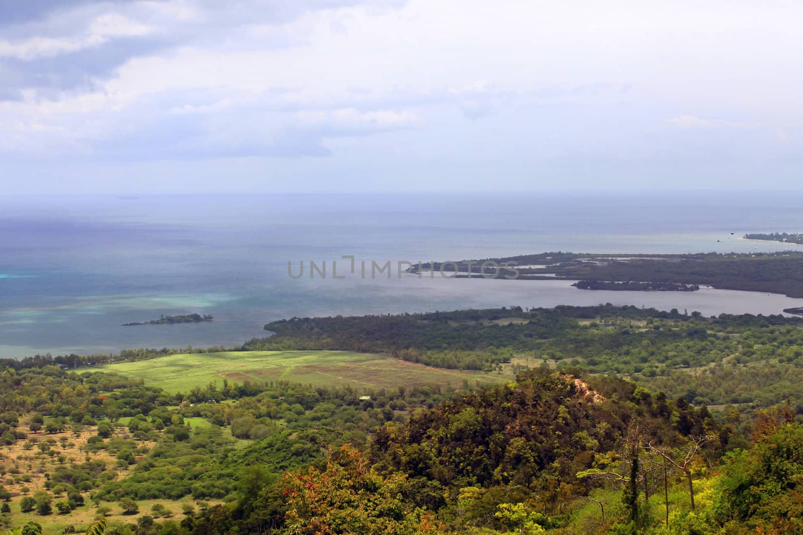 Mauritius: beach, clear waters and dramatic sky