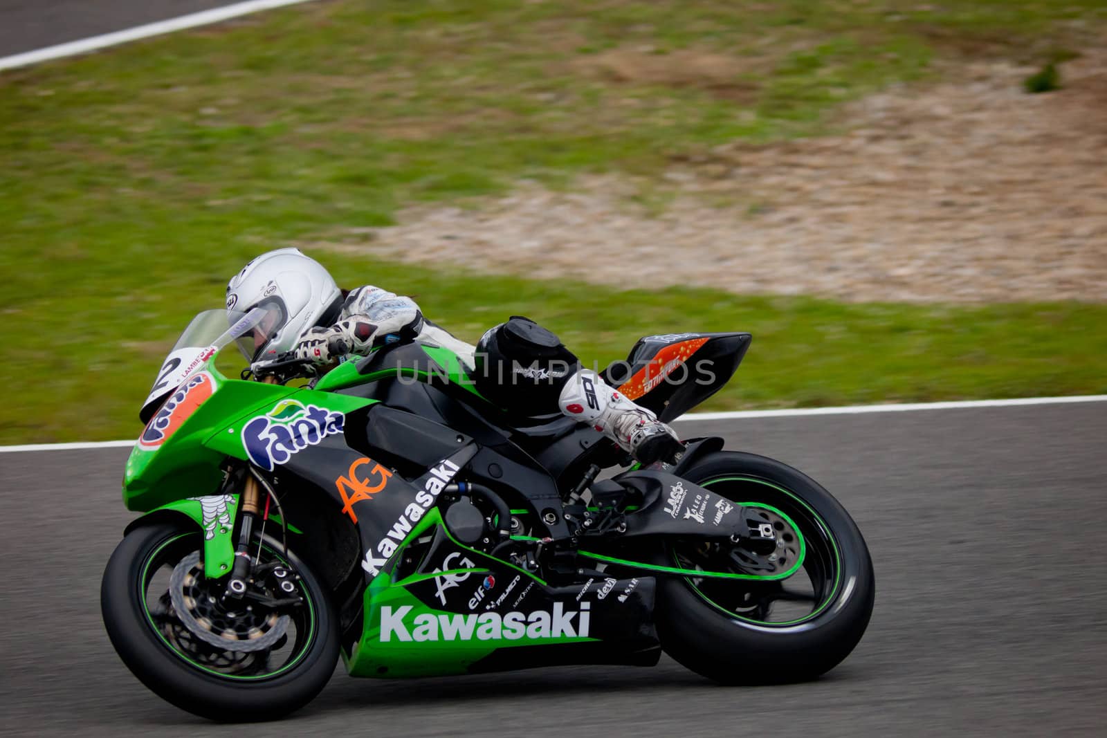 JEREZ DE LA FRONTERA, SPAIN - NOV 20: Stock Extreme motorcyclist Elena Rosell takes a curve in the CEV championship on Nov 20, 2010, in Jerez de la Frontera, Spain