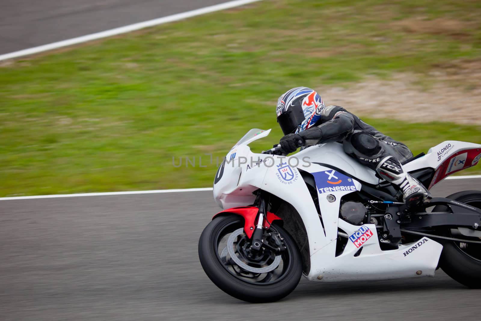 JEREZ DE LA FRONTERA, SPAIN - NOV 20: Stock Extreme motorcyclist Juan Alonso races in the CEV championship on Nov 20, 2010, in Jerez de la Frontera, Spain