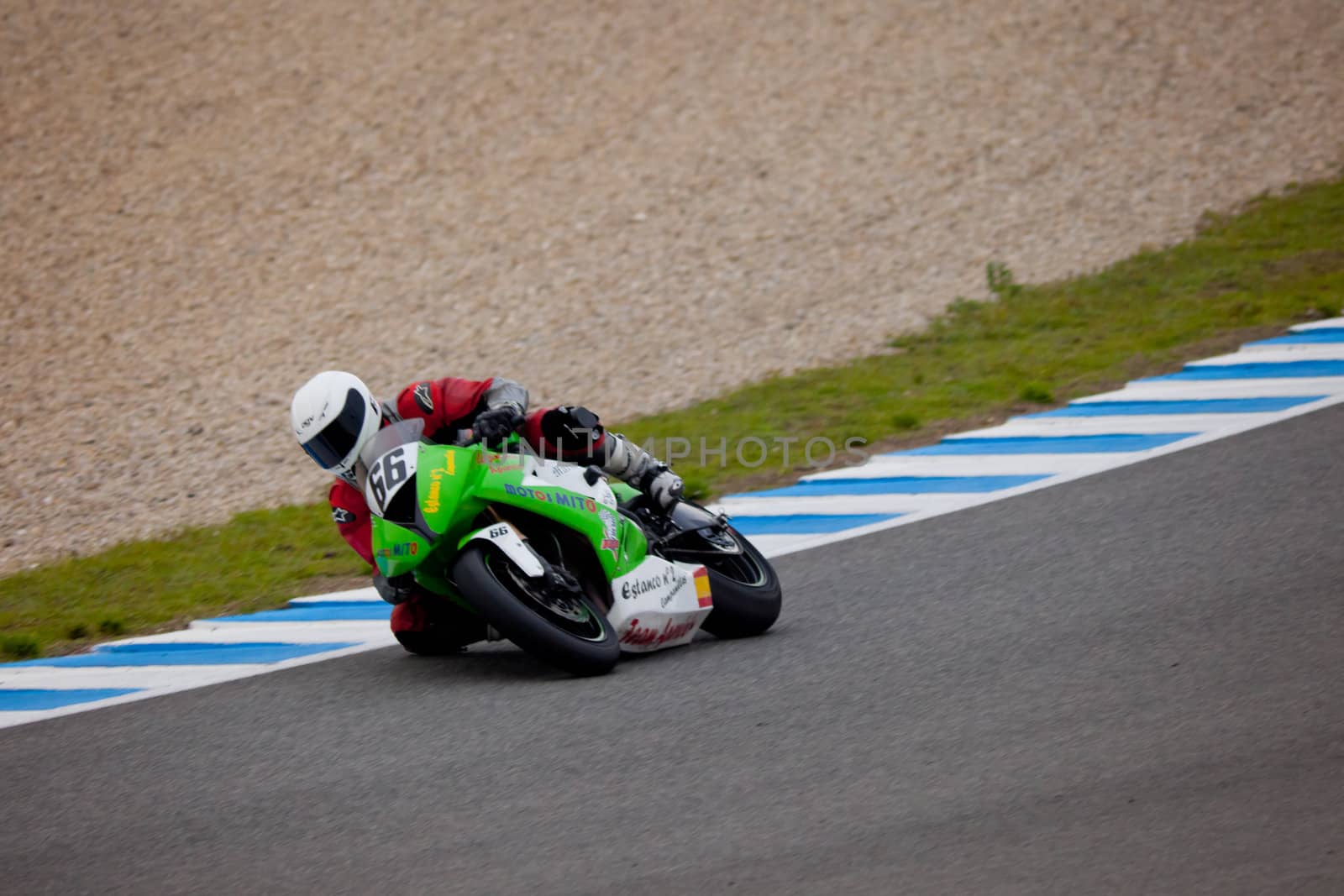 JEREZ DE LA FRONTERA, SPAIN - NOV 20: Stock Extreme motorcyclist Andres Aparicio takes a curve in the CEV championship on Nov 20, 2010, in Jerez de la Frontera, Spain