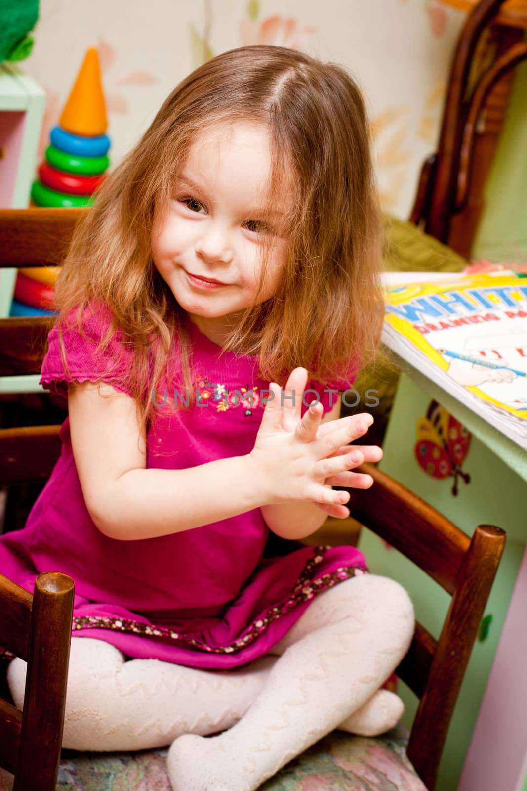 portrait of a happy little girl  indoor