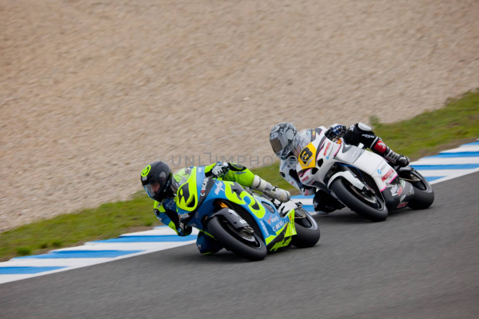 JEREZ DE LA FRONTERA, SPAIN - NOV 20: MOTO2 motorcyclist Jordi Torres and Daniel Arcas takes a curve in the CEV championship on Nov 20, 2010, in Jerez de la Frontera, Spain