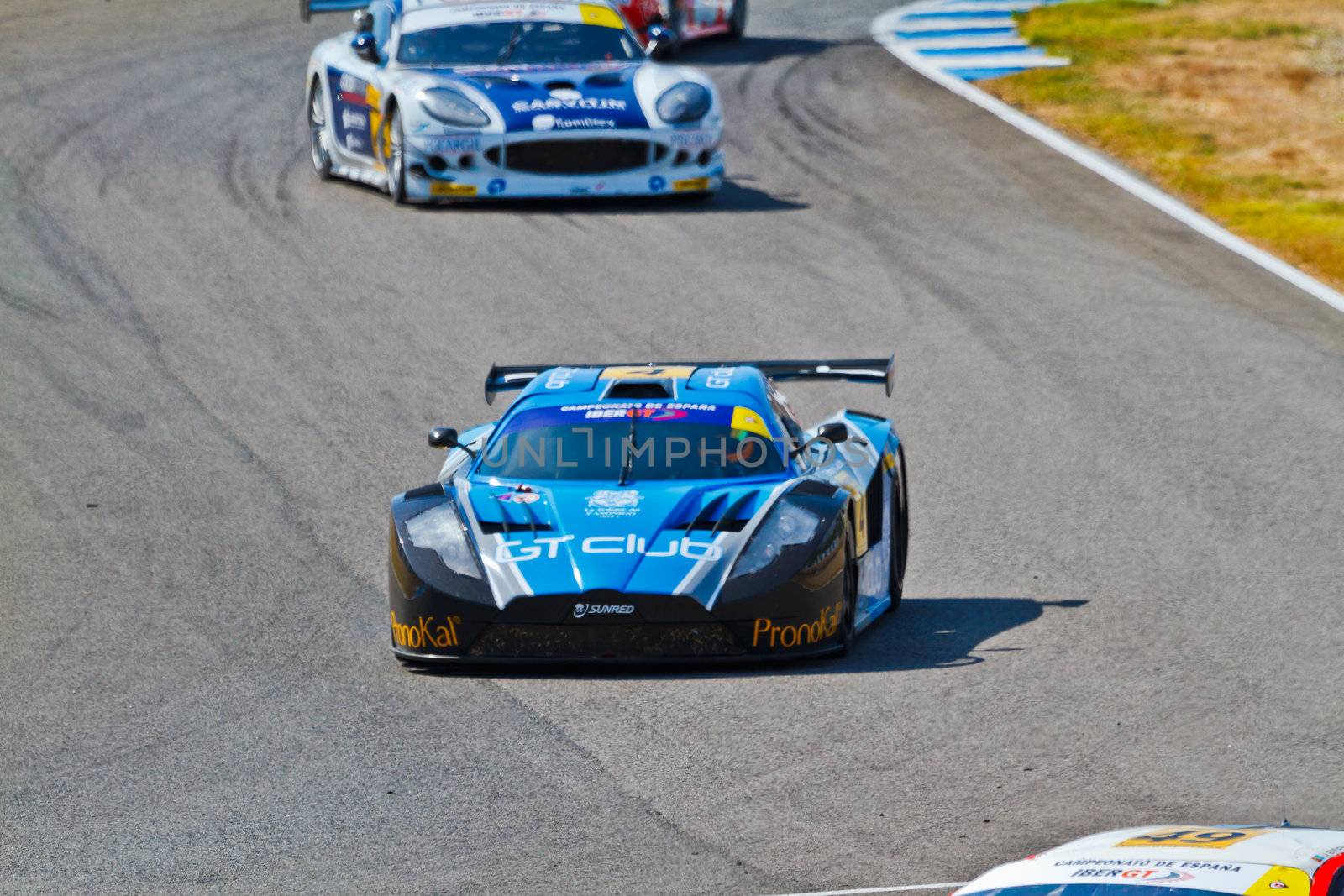 JEREZ DE LA FRONTERA, SPAIN - OCT 16: Ferran Monje(4) followed by Pedro Lopes(44) races on Iber GT championship on October 16 , 2011, in Jerez de la Frontera , Spain