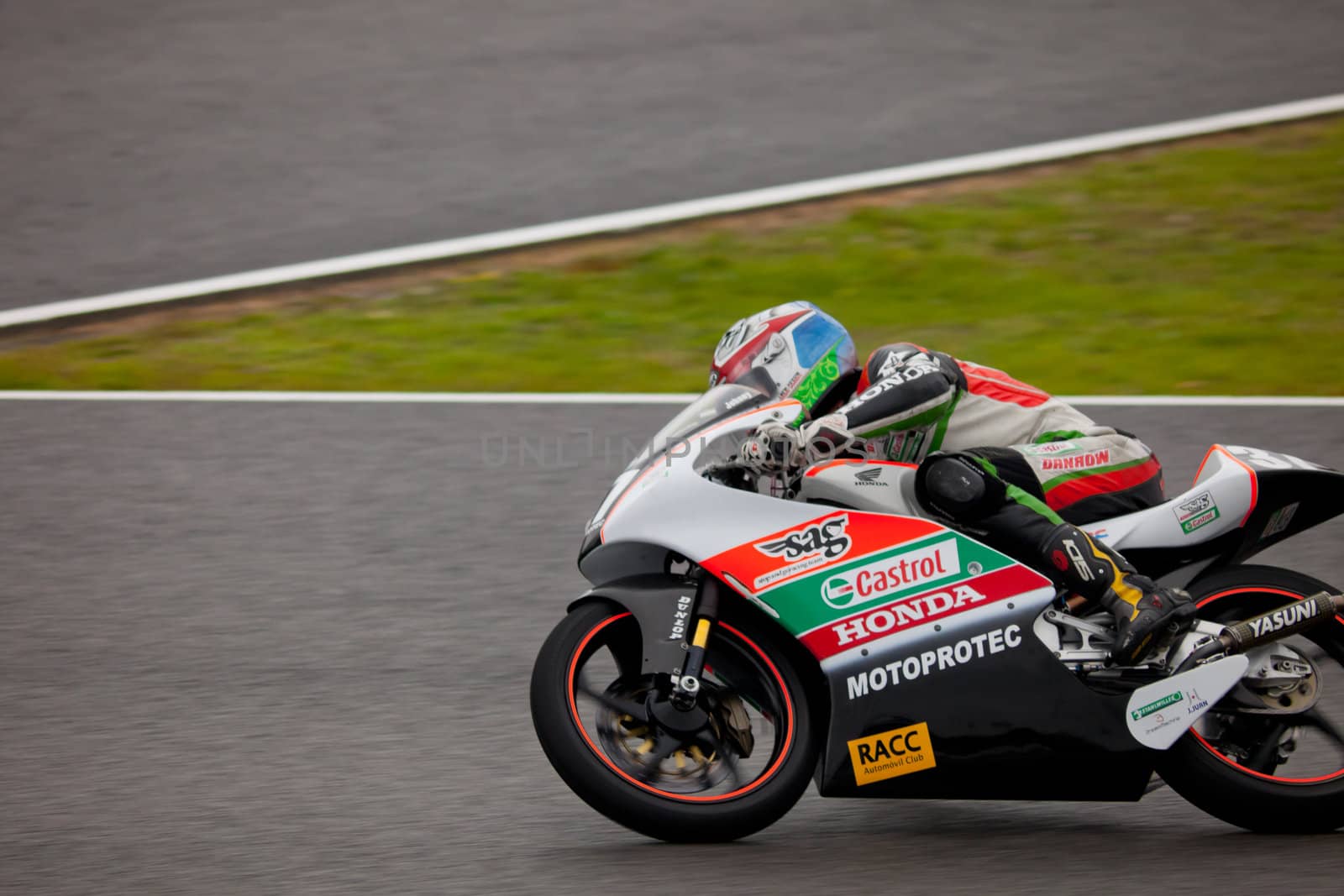 JEREZ DE LA FRONTERA, SPAIN - NOV 20: 125cc motorcyclist Johnny Rosell races in the CEV Championship on Nov 20, 2010, in Jerez de la Frontera, Spain