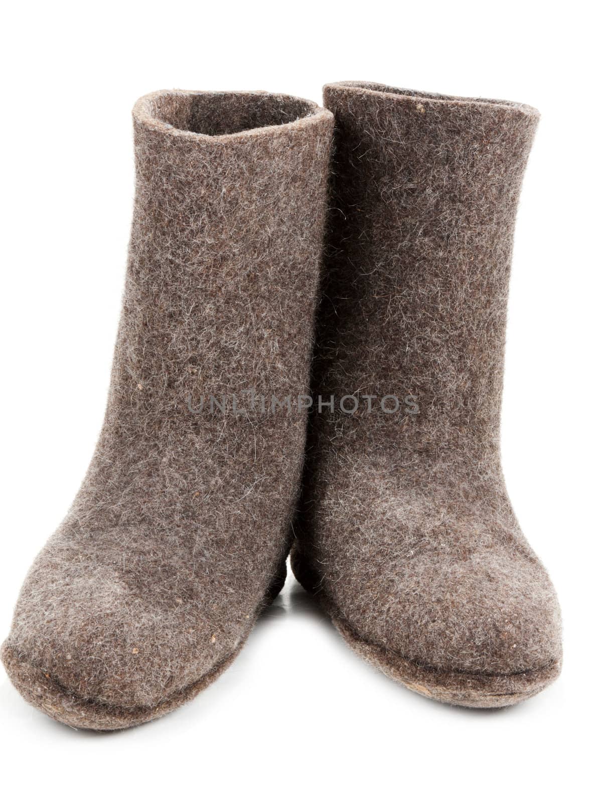 Pair gray woolly lock footwear on white background