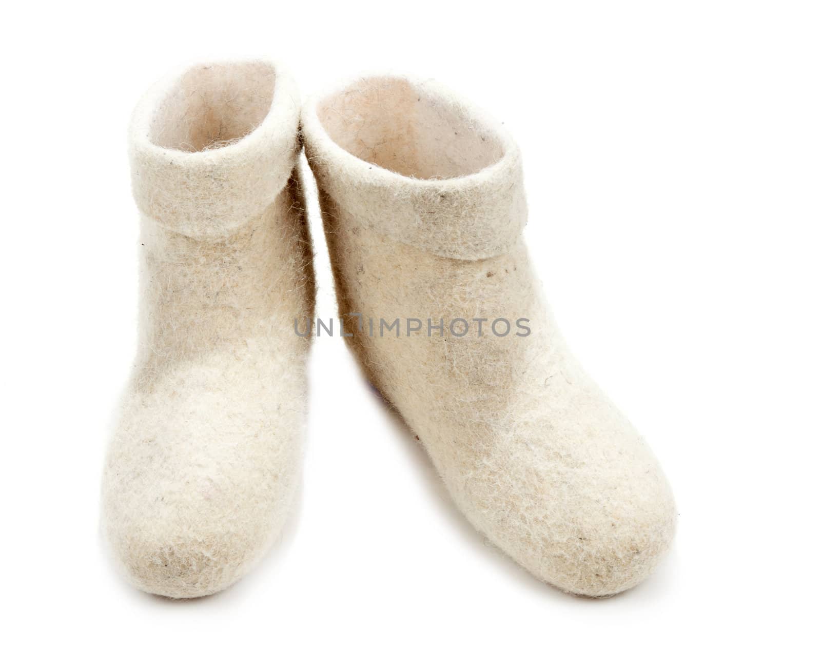 Pair light woolly lock footwear on white background