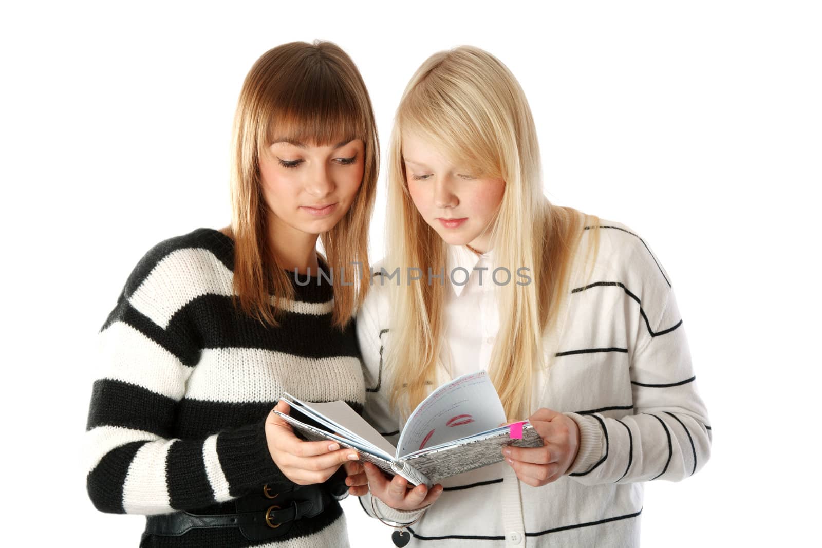 Two beautiful girls read diary book on white background