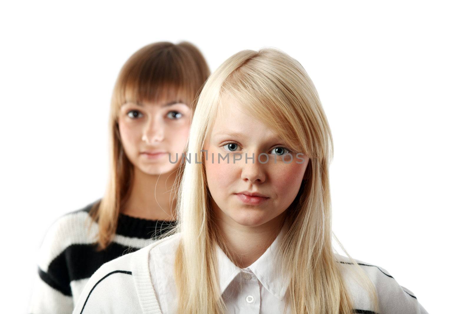 Portrait two girls small depth to sharpnesses on white background