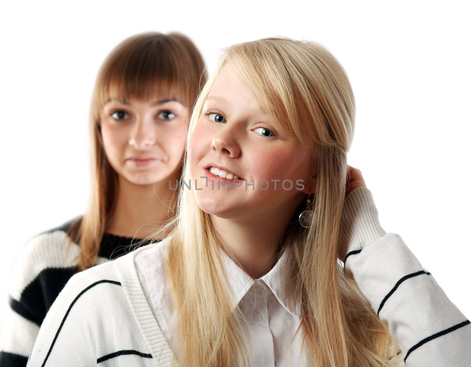 Portrait two girls small depth to sharpnesses on white background