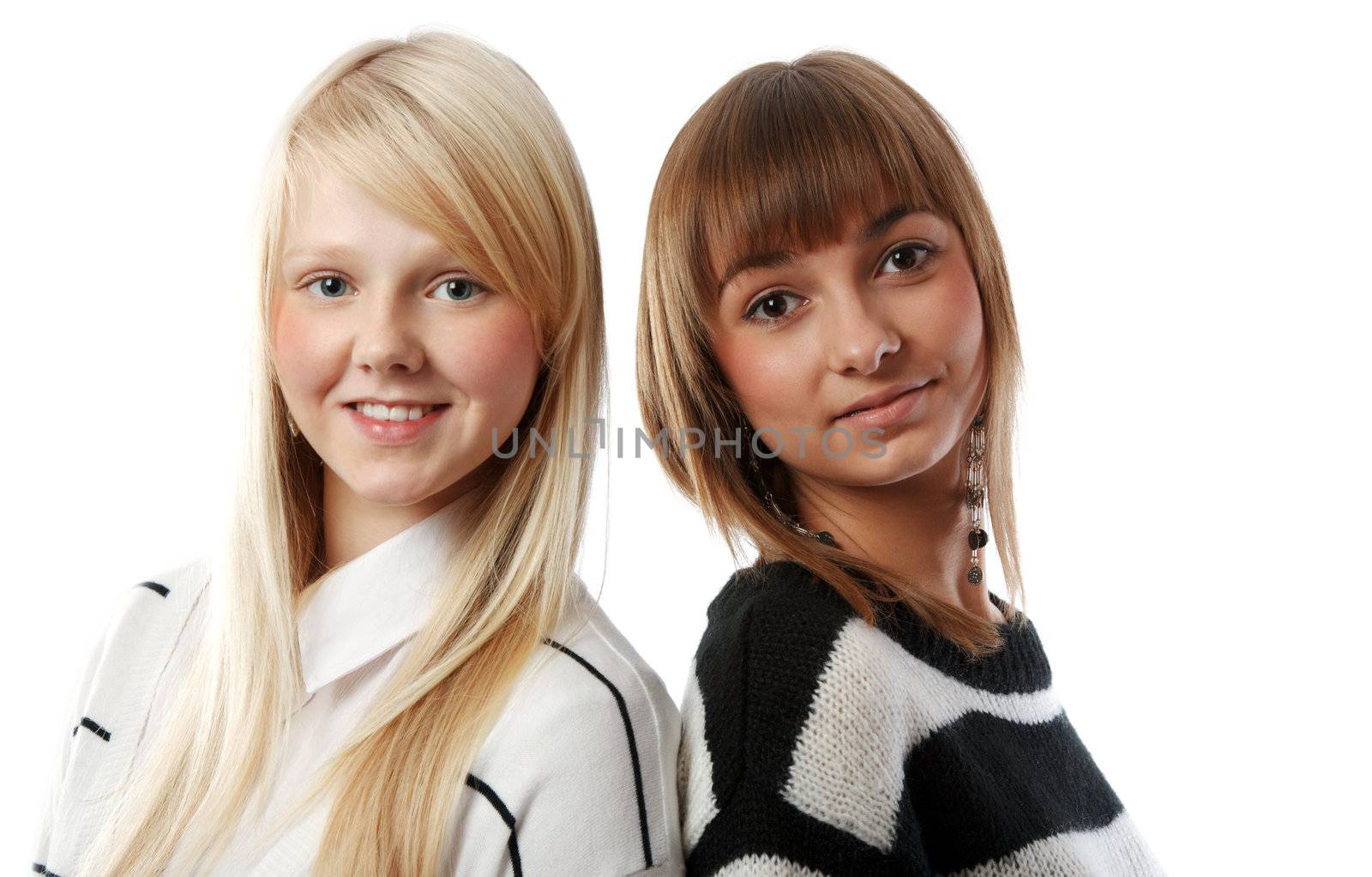 Portrait two girls of the blonde and brunettes insulated on white background