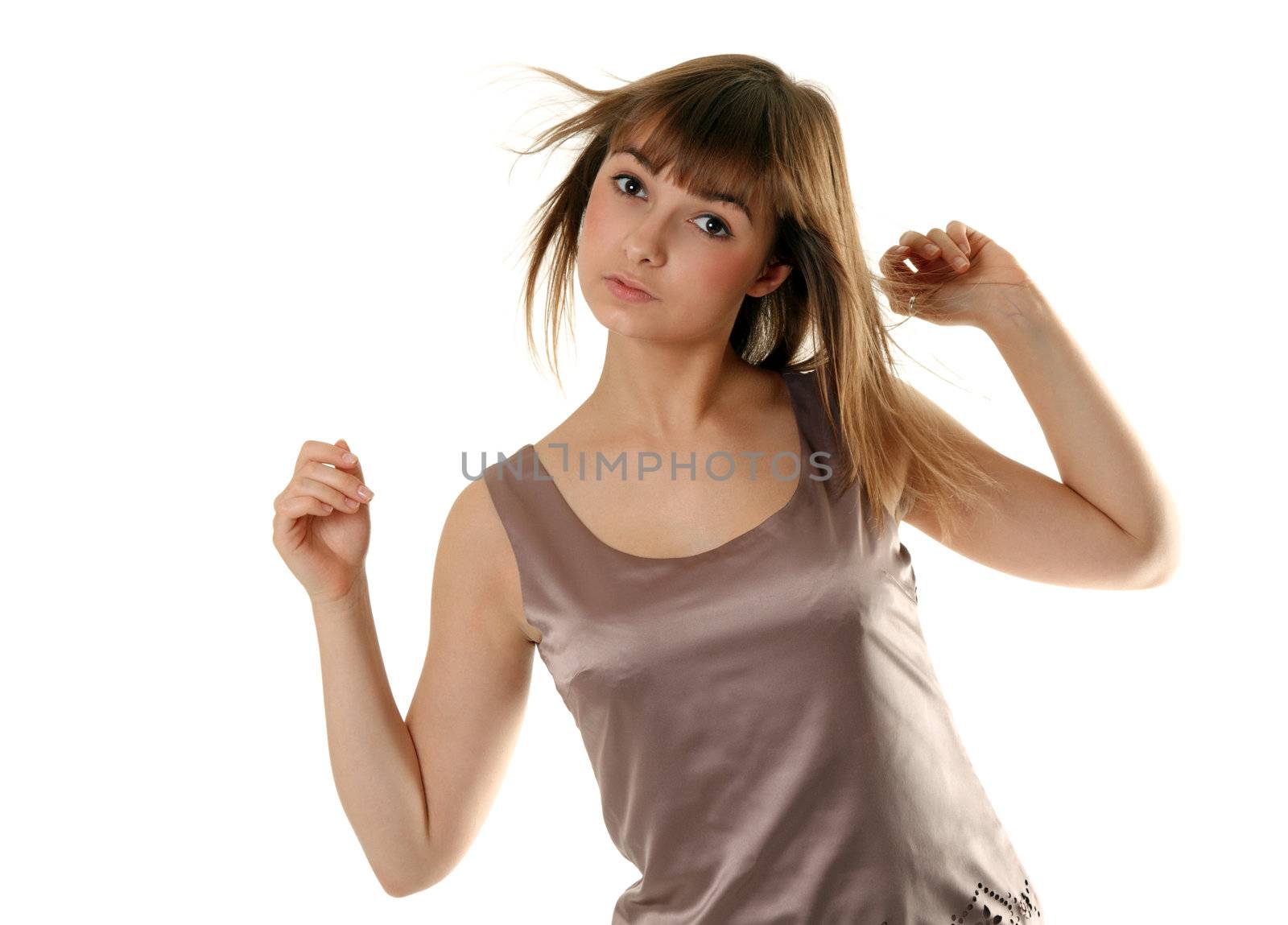 Beautiful girl in satin gown on white background